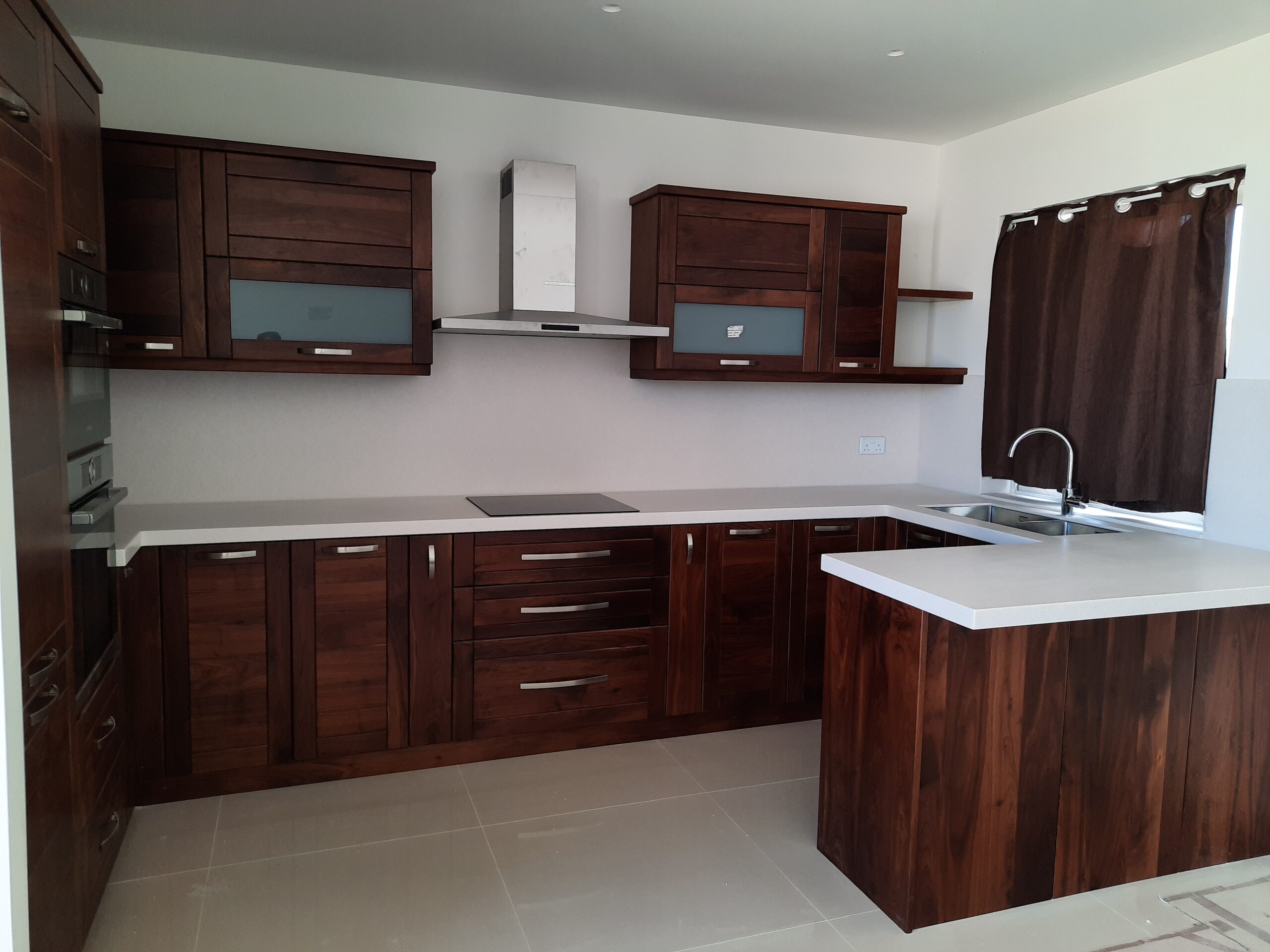 "Modern wooden kitchen design in Malta with sleek cabinetry"