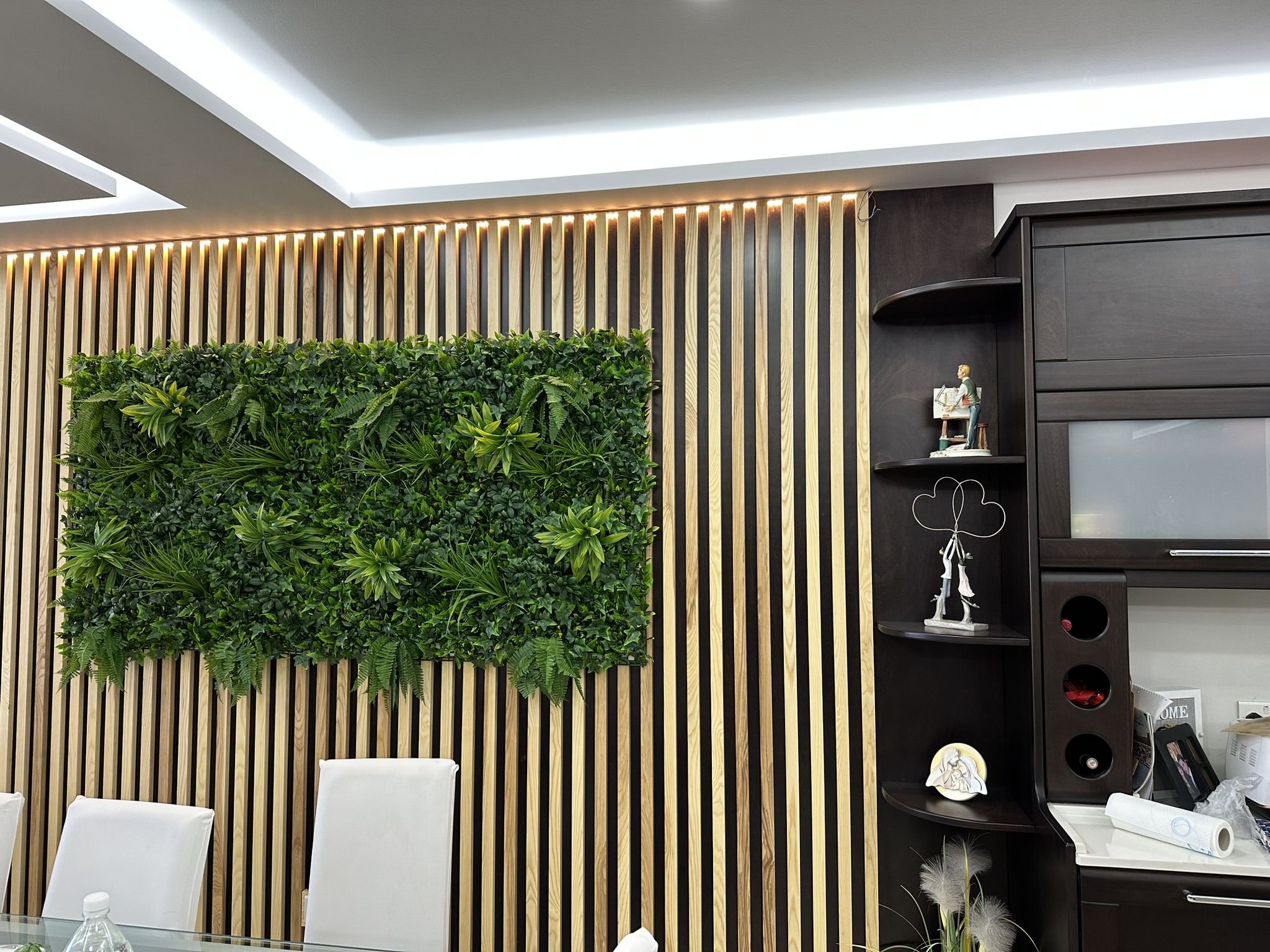 Rustic wood feature wall in Malta interior design.