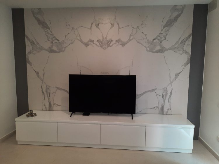 "Custom wood TV unit with shelving in a modern living room"